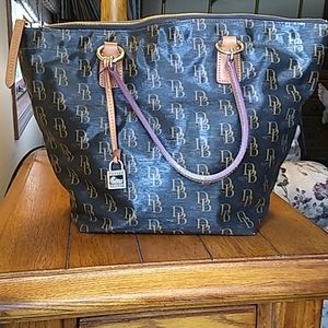 Dooney & Bourke 1975 black w/tan logo & trim